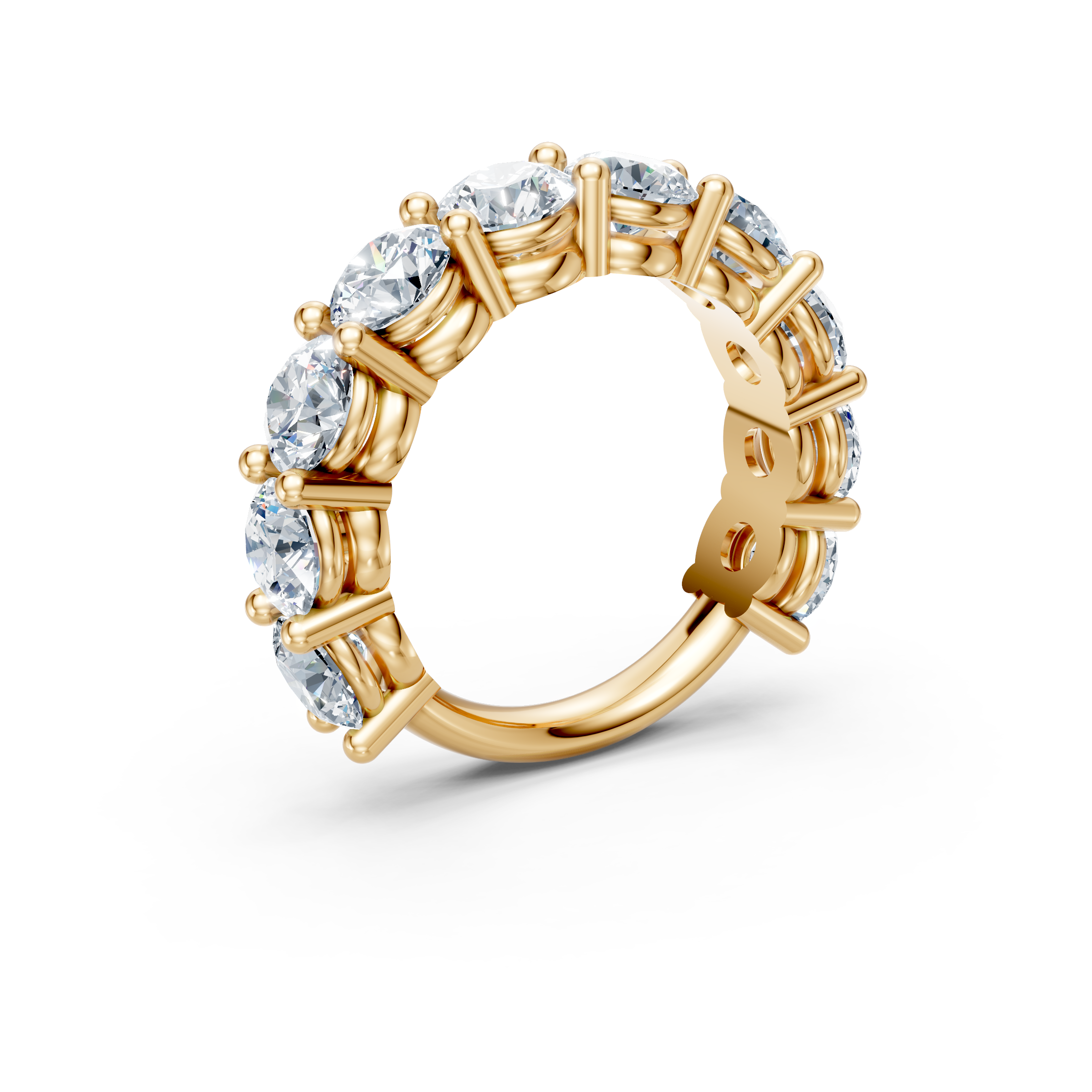 Yellow gold eternity band with round-cut diamonds in prong settings, custom jewelry design