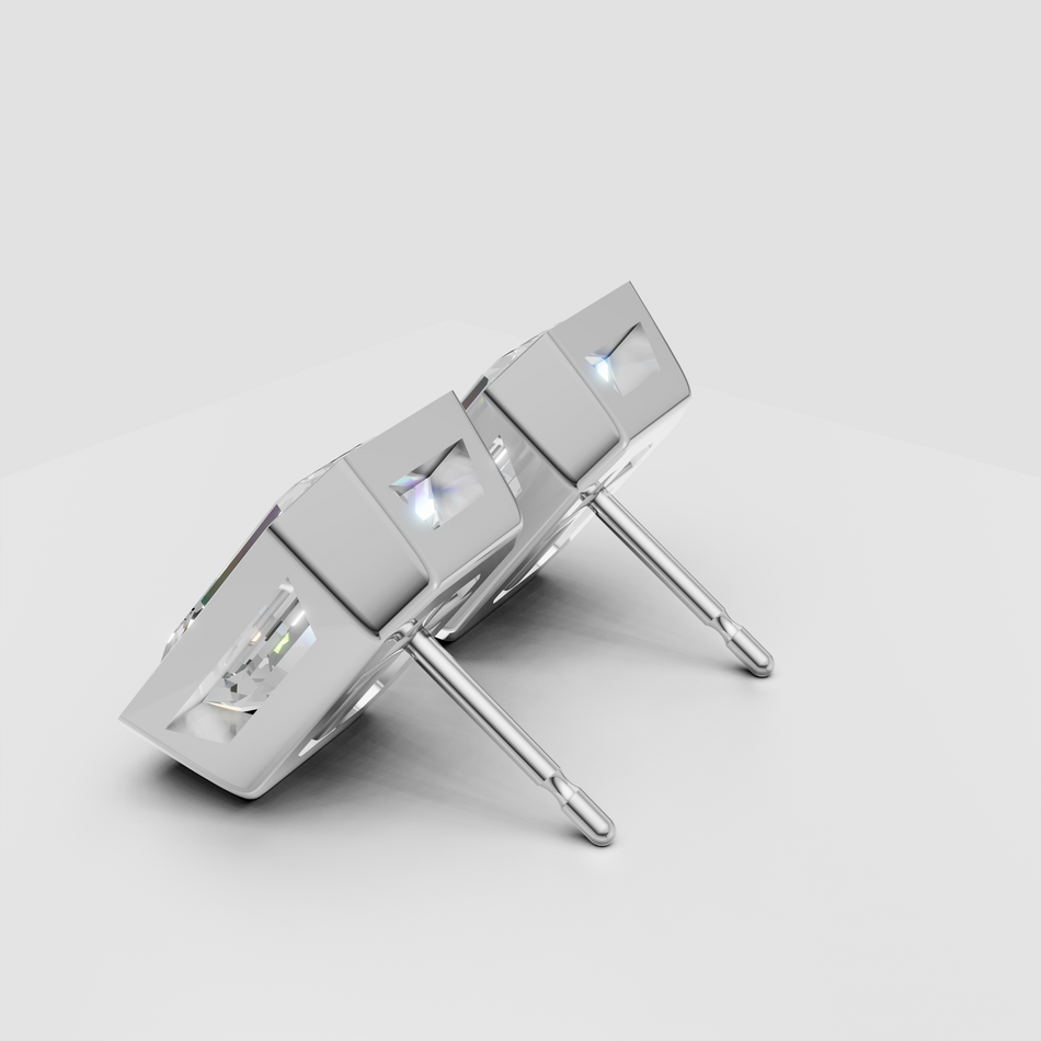 Square-cut diamond stud earrings in white gold setting on white background