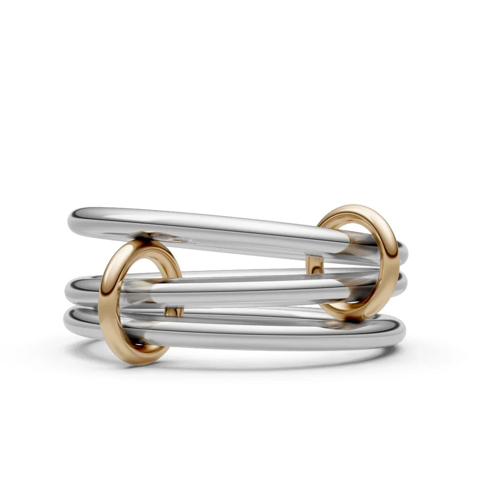 Modern two-tone ring with interlocking gold and silver bands, minimalist jewelry design