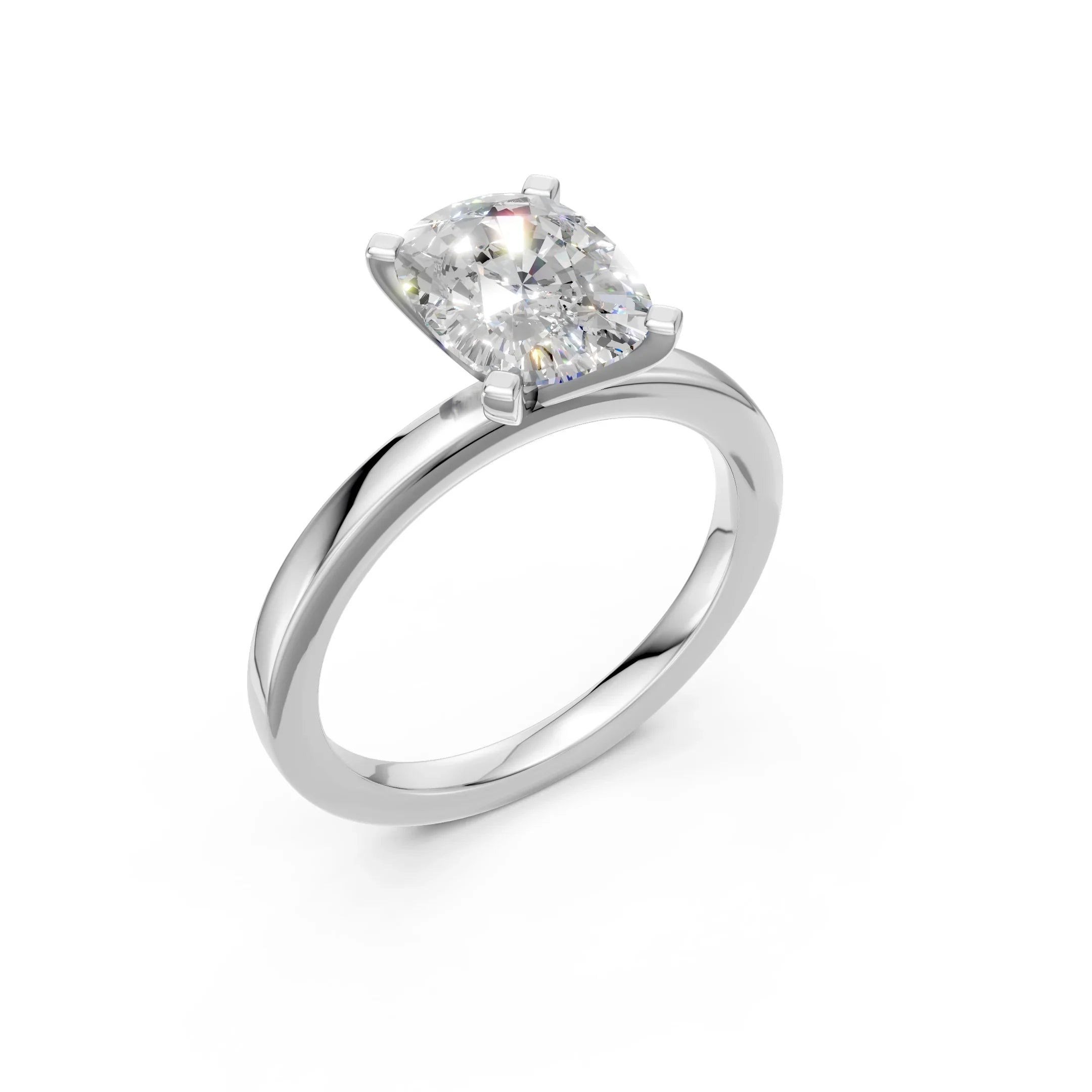 Cushion cut diamond engagement ring with four-prong setting on sleek white gold band