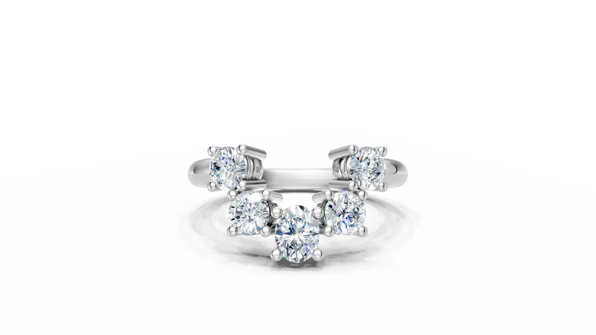 Elegant three-stone diamond engagement ring with round brilliants in white gold, perfect for custom designs.