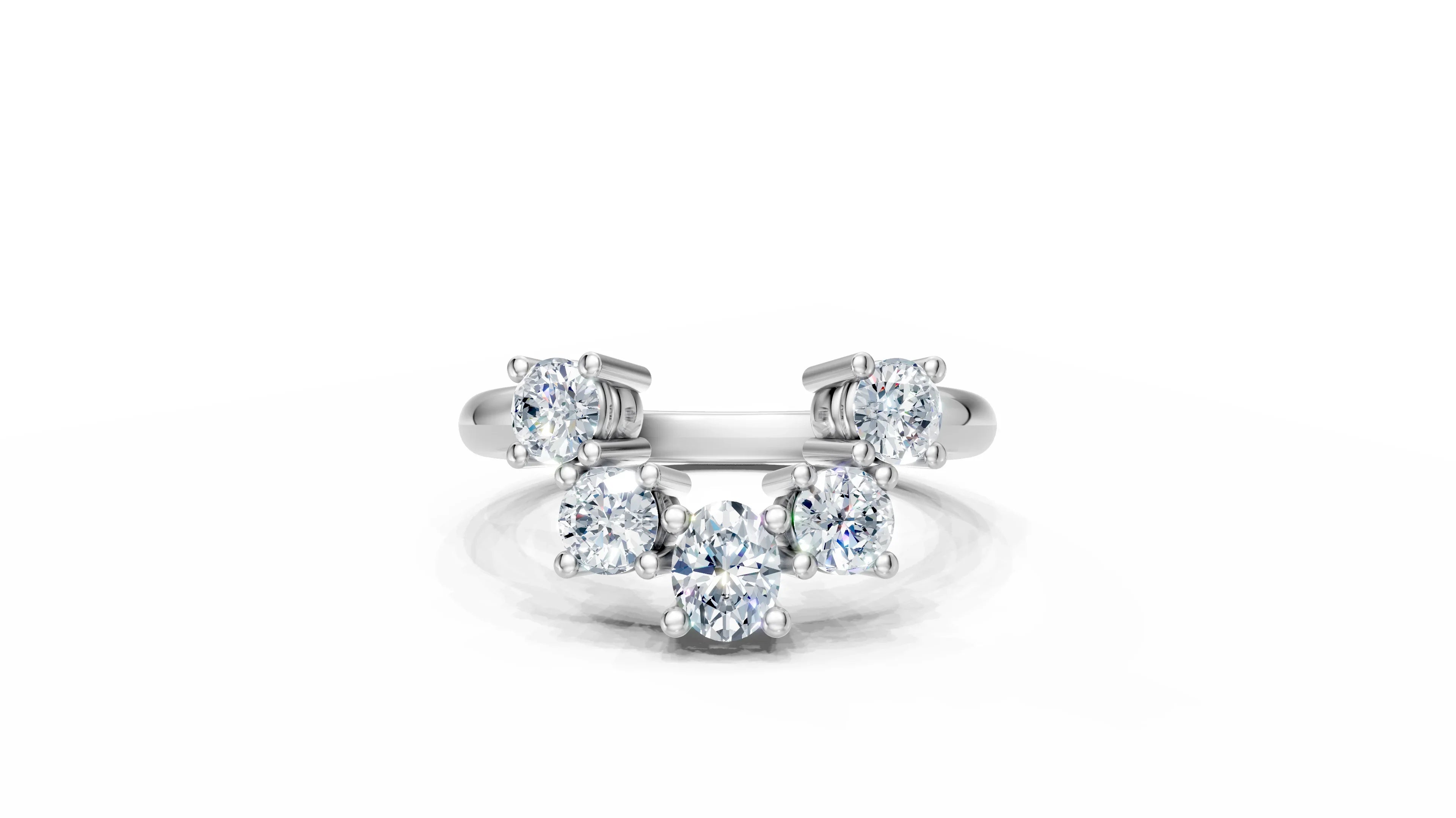 Elegant three-stone diamond engagement ring with round brilliants in white gold, perfect for custom designs.