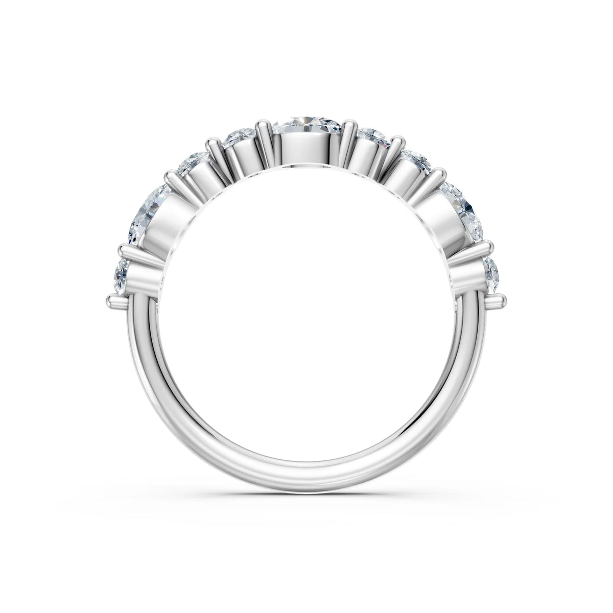 Elegant white gold engagement ring with round diamonds in a shared prong setting, showcasing brilliance and timeless design.