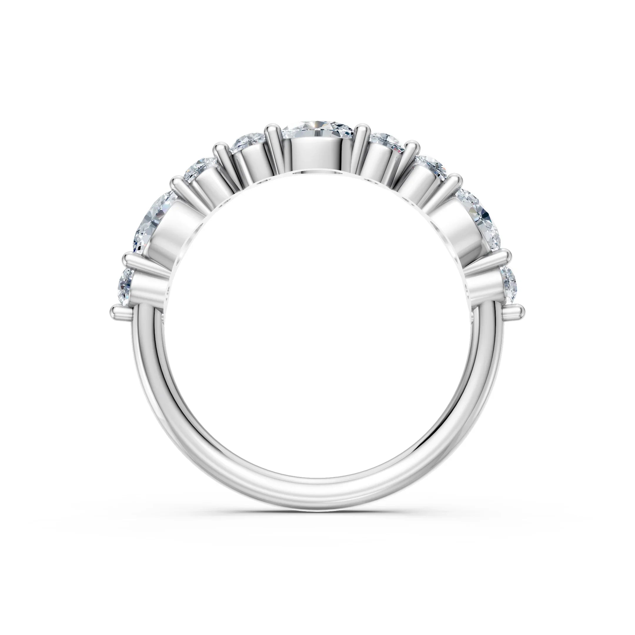 Elegant white gold engagement ring with round diamonds in a shared prong setting, showcasing brilliance and timeless design.