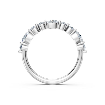 Elegant white gold engagement ring with round diamonds in a shared prong setting, showcasing brilliance and timeless design.