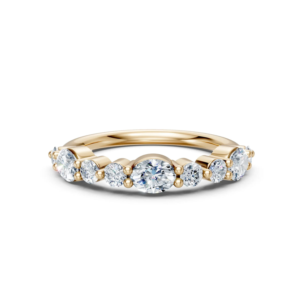 Yellow gold engagement ring with round diamonds in a shared prong setting