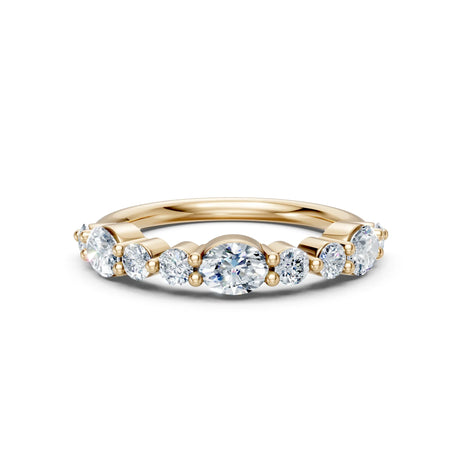 Yellow gold engagement ring with round diamonds in a shared prong setting