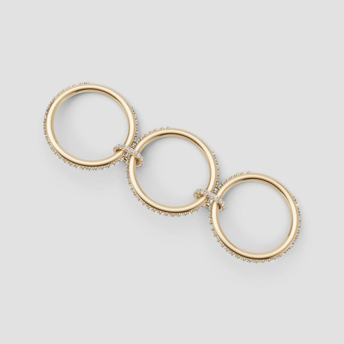 Elegant gold rings with diamond accents, perfect for custom engagement or bespoke jewelry designs.