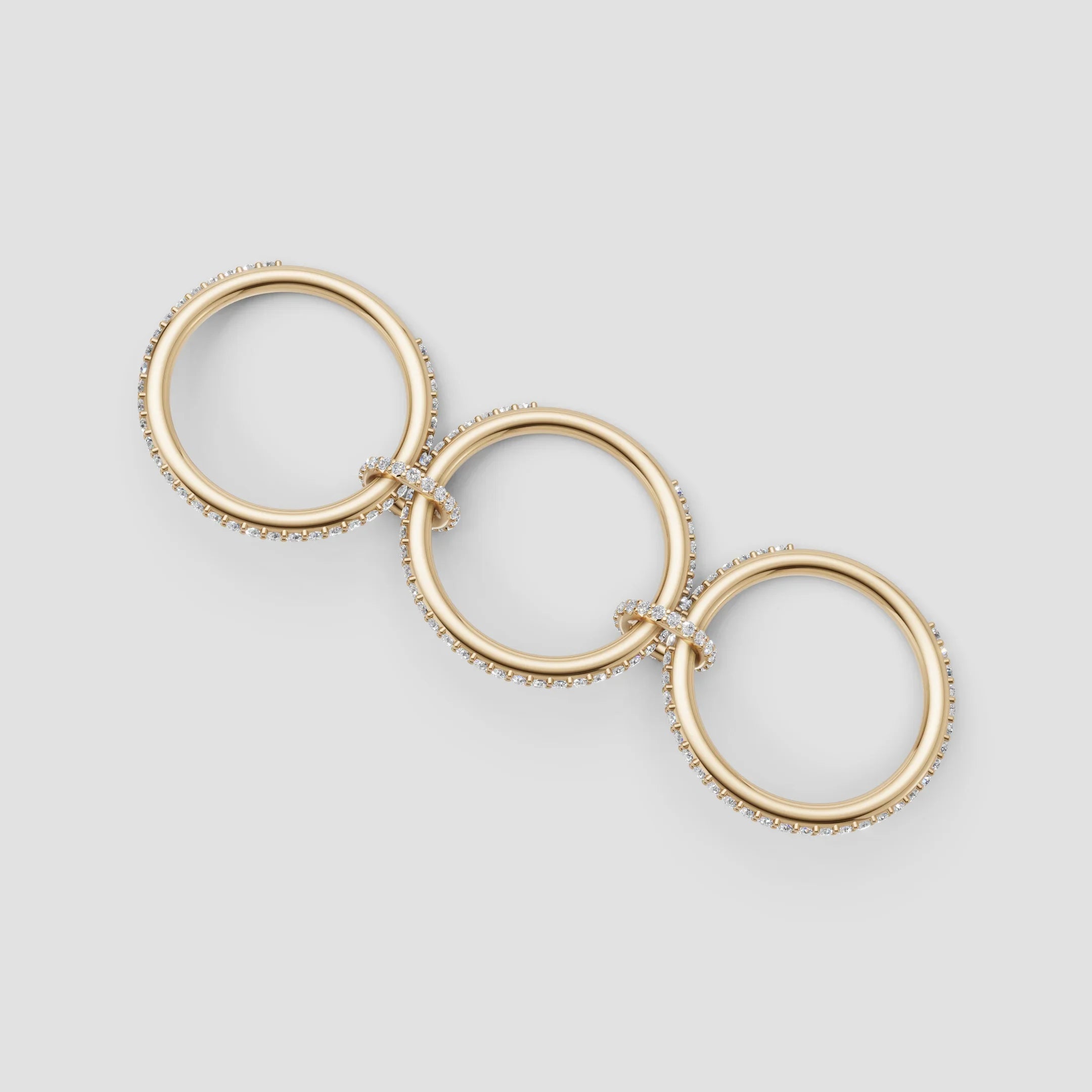 Elegant gold rings with diamond accents, perfect for custom engagement or bespoke jewelry designs.