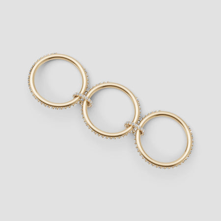 Elegant gold rings with diamond accents, perfect for custom engagement or bespoke jewelry designs.