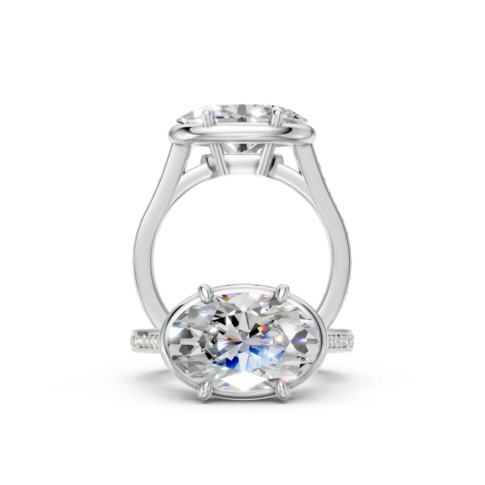 Elegant oval diamond engagement ring with side accents and sleek band design