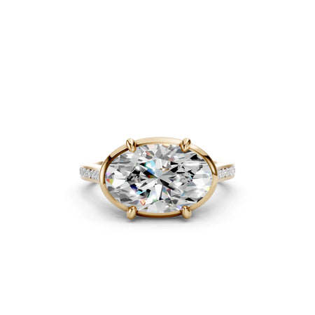 Oval diamond engagement ring in gold with diamond accents, custom made-to-order jewelry