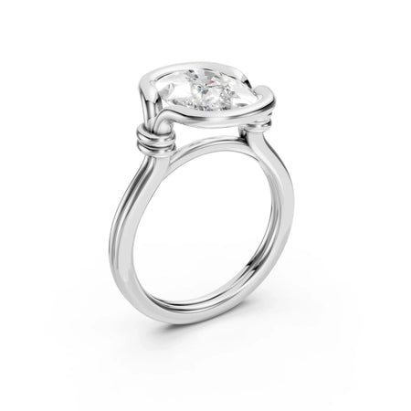 Custom engagement ring with unique twisted band and sparkling diamond center