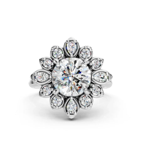 Floral halo engagement ring with round center diamond and pear-shaped accents, custom jewelry design