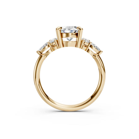 Yellow gold engagement ring with round center diamond and side accents, custom made-to-order design