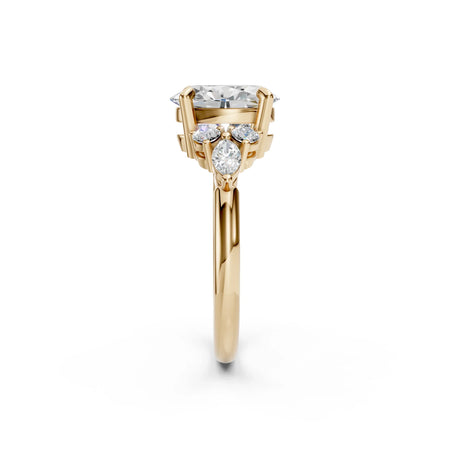 Elegant gold engagement ring with a large central diamond and side accents, perfect for custom designs.