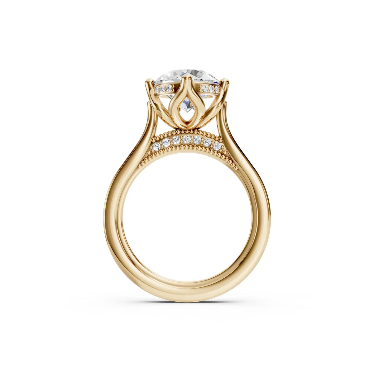 Luxury gold engagement ring with round diamond center, diamond accents, and intricate band design