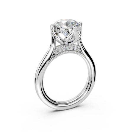 Elegant custom engagement ring with diamond centerpiece and intricate band design
