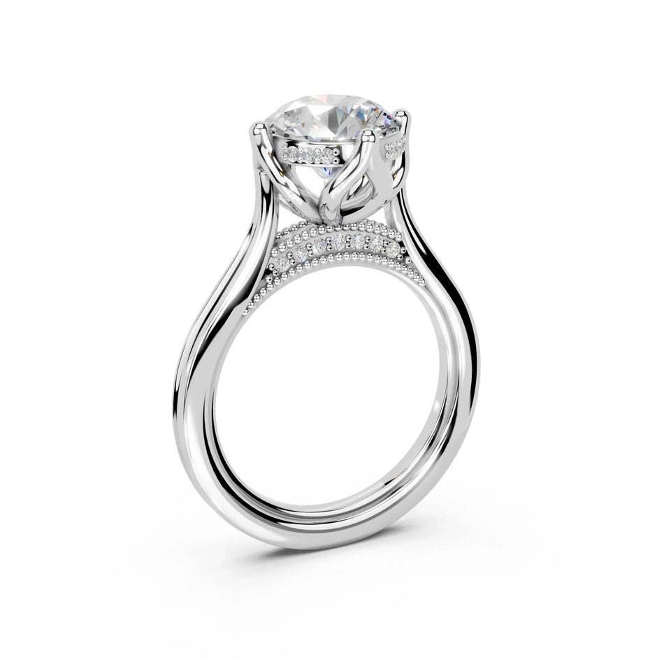 Elegant custom engagement ring with diamond centerpiece and intricate band design