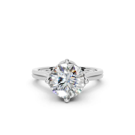 Elegant round diamond engagement ring with four-prong setting and sleek band design