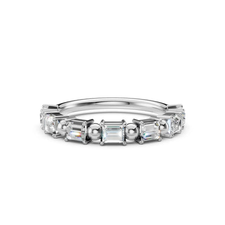 Silver wedding band featuring a row of emerald-cut diamonds with spherical accents