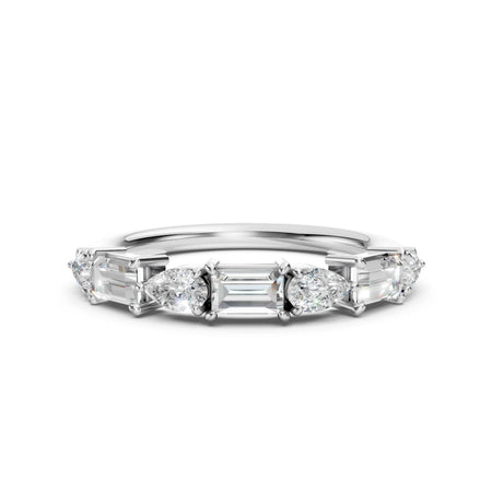 Custom white gold wedding band featuring pear and baguette diamond accents