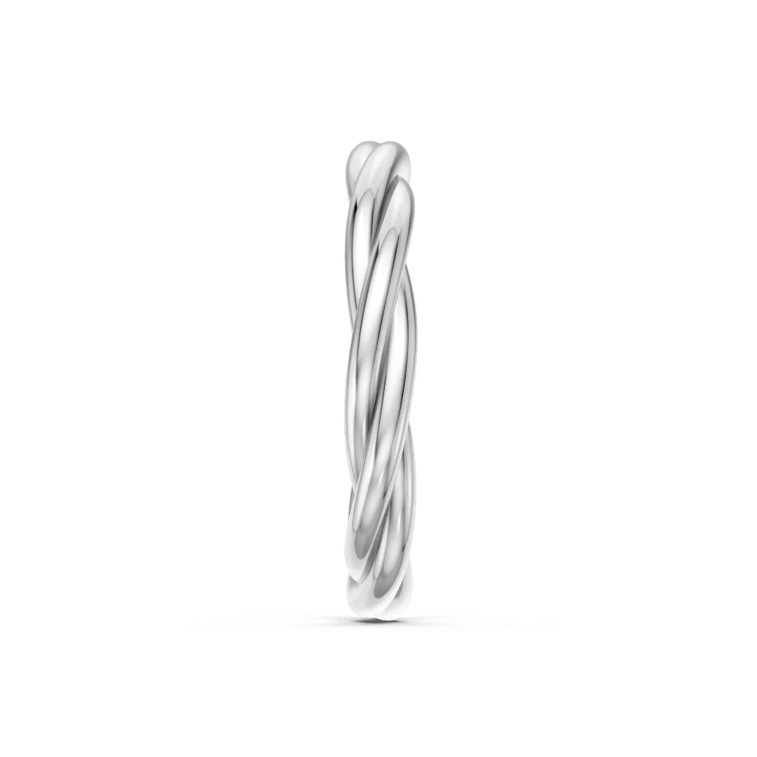 Side view of a polished silver twisted band ring on a white background