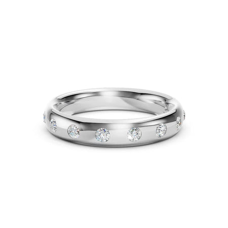 Bel Viaggio Designs flush set wedding band with lab diamonds in a polished silver finish