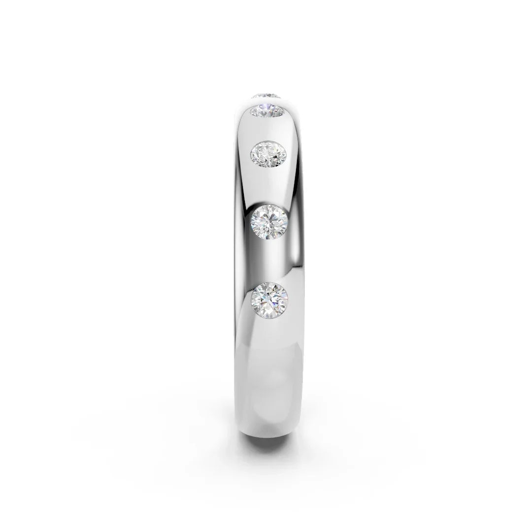 Bel Viaggio Designs flush set wedding band featuring round lab diamonds in a silver-tone metal