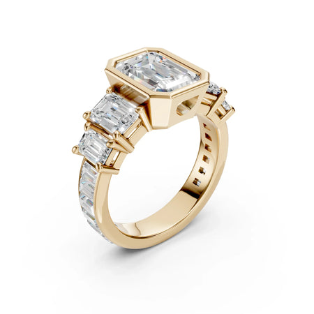 Bel Viaggio Designs graduated emerald cut lab diamond anniversary ring in yellow gold