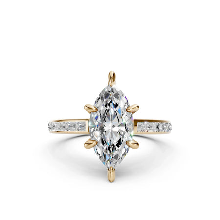 Marquise diamond engagement ring with baguette side stones in a yellow gold setting by Bel Viaggio Designs