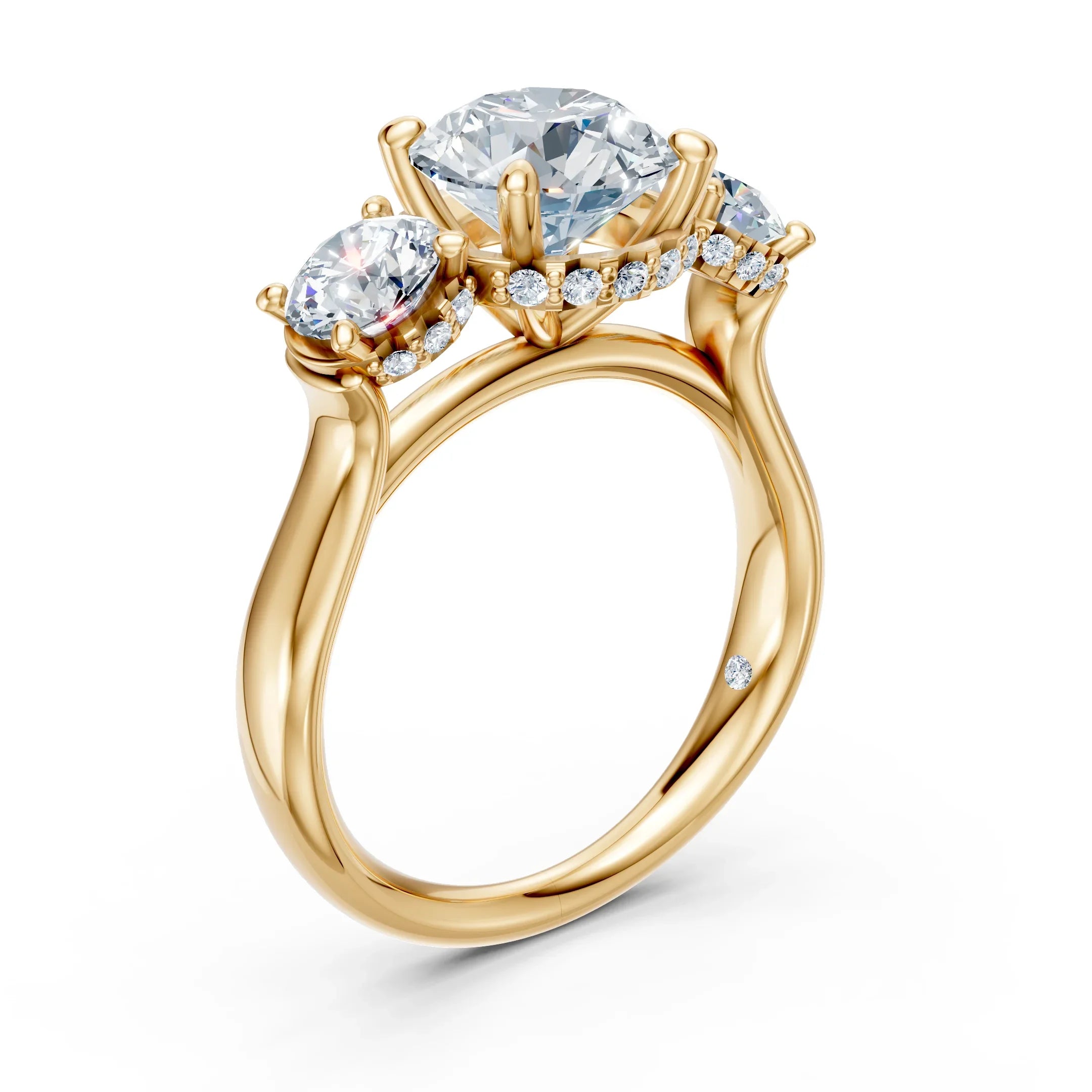 Three stone gold engagement ring with round diamonds and pavé accents