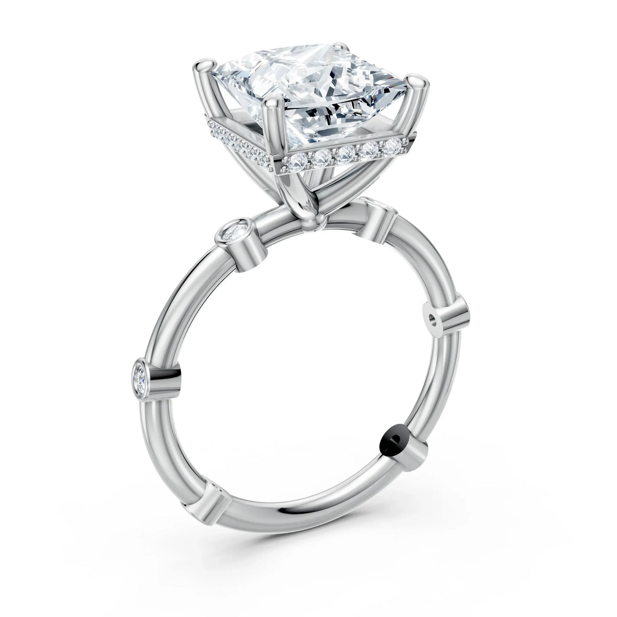Platinum engagement ring with princess-cut center diamond and side accent stones