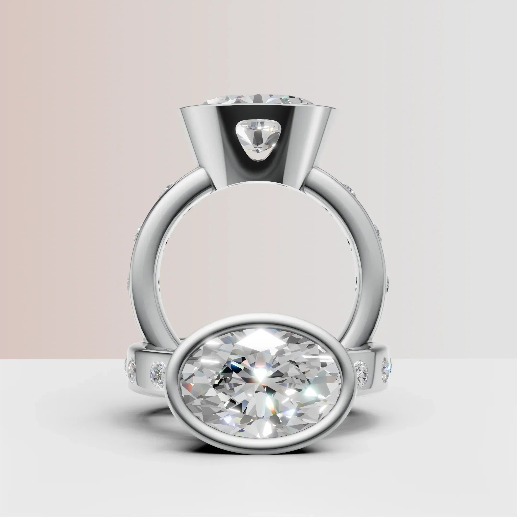 Oval-cut diamond engagement ring in white gold with side accent diamonds on band