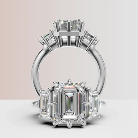 Custom emerald cut diamond engagement ring with baguette side stones in white gold setting