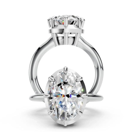Oval-cut diamond solitaire engagement ring in a six-prong white gold setting