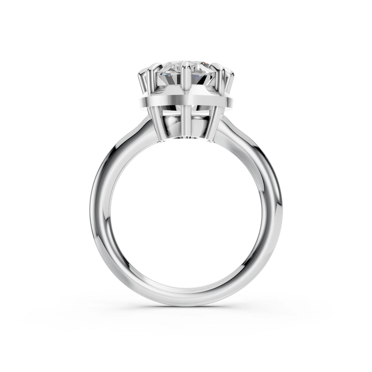 Side view of a solitaire diamond engagement ring with a white gold band