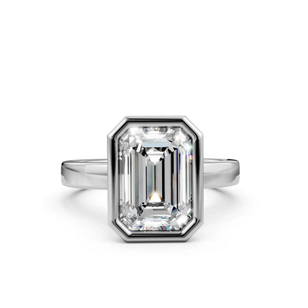 Emerald cut diamond solitaire engagement ring with sleek white gold band