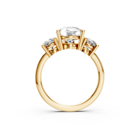Three stone gold engagement ring with round cut diamonds, side profile view
