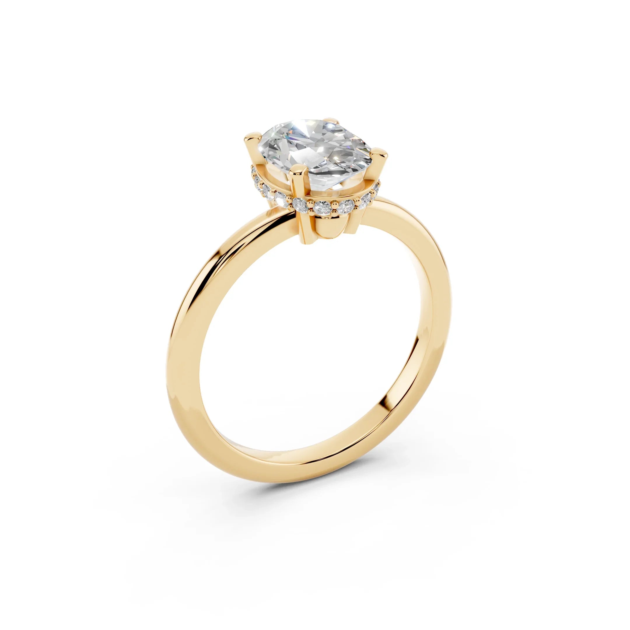 Yellow gold engagement ring with round solitaire diamond and pavé accent stones