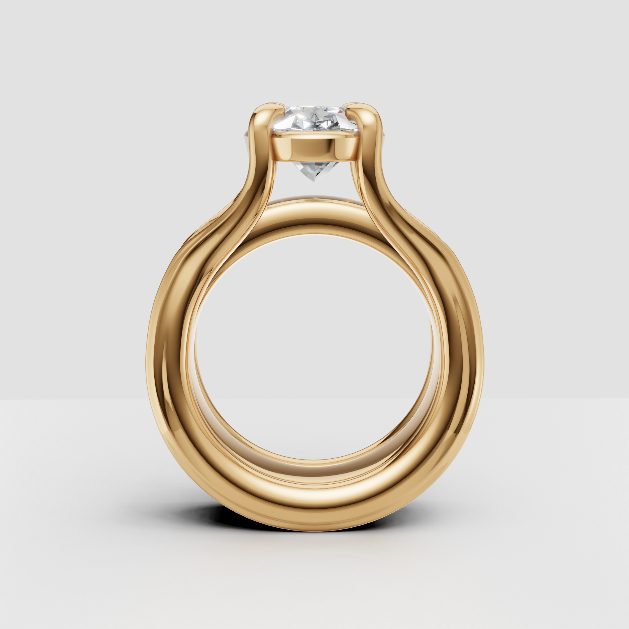 Yellow gold solitaire engagement ring with round diamond, modern open setting