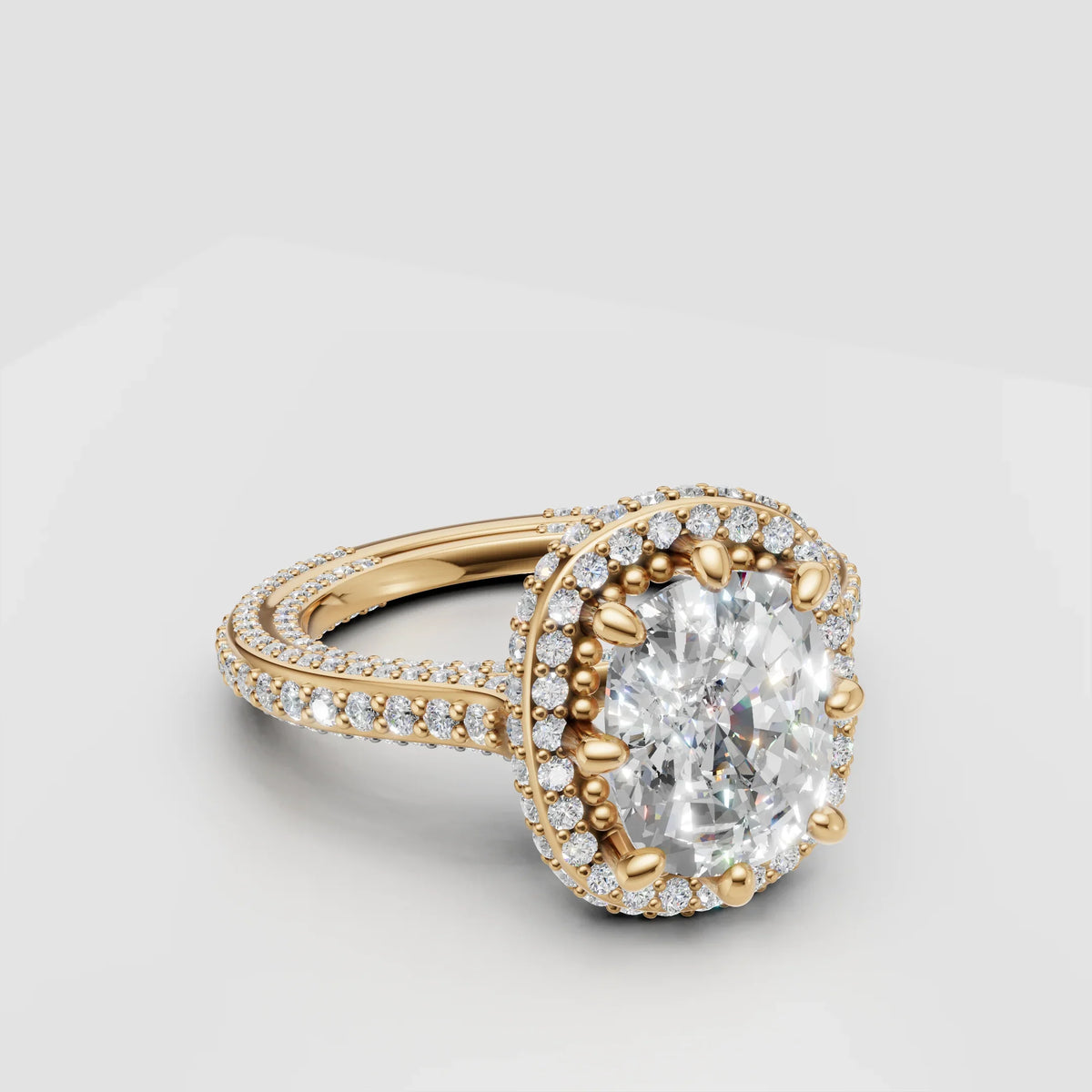 Gold halo engagement ring with round center diamond and pavé diamond band