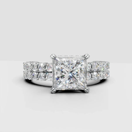 Princess cut diamond engagement ring with double band and pavé set diamonds