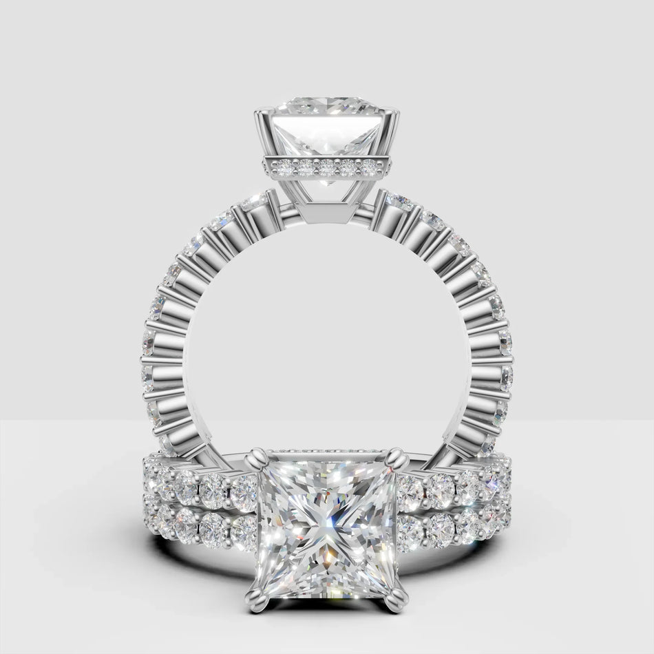 Princess cut diamond engagement ring with pavé band in white gold, custom jewelry design