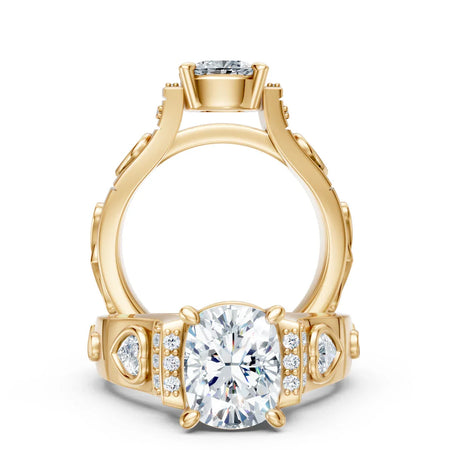 Yellow gold engagement ring with large oval center diamond, side diamonds, and intricate detailing