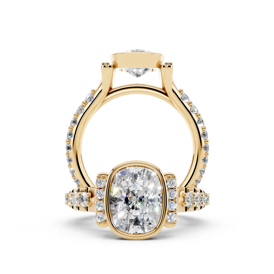 Custom yellow gold engagement ring with cushion-cut center diamond and pavé band