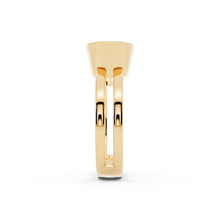 Side view of a modern gold engagement ring with split shank design on white background
