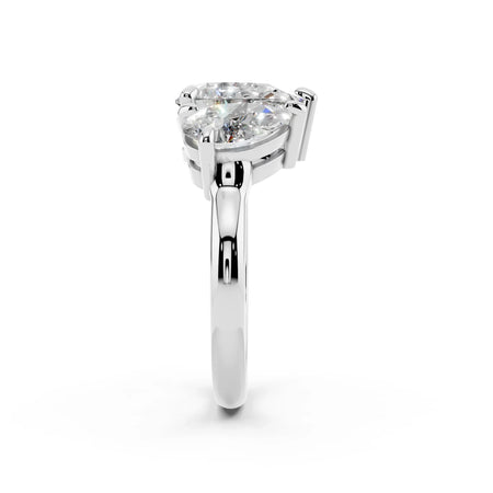 Side view of a white gold engagement ring with a heart-shaped diamond setting