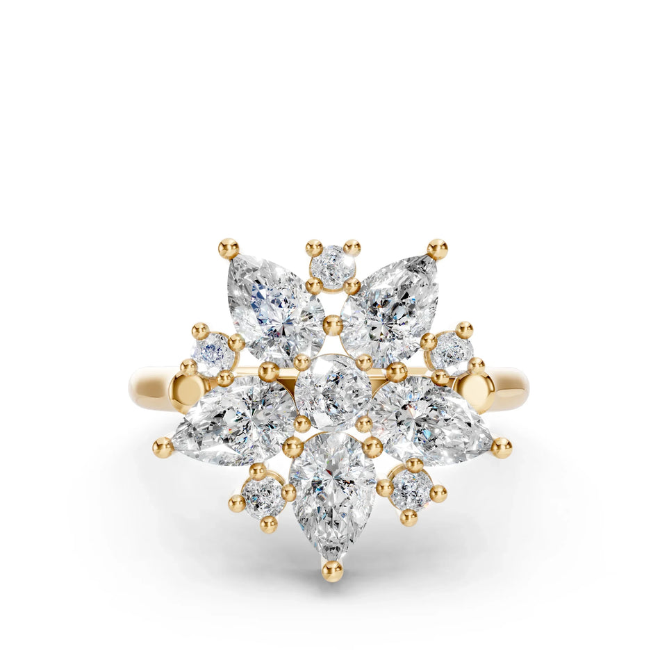 Gold ring with marquise and round diamonds arranged in a floral cluster setting