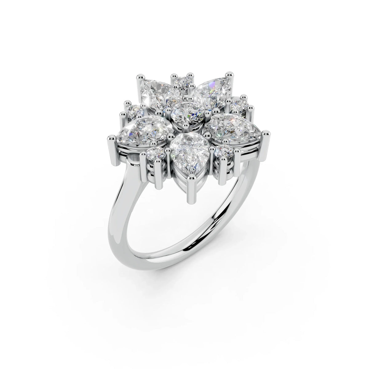 Cluster diamond engagement ring with pear and round cut stones in white gold setting